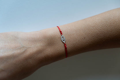 EVIL EYE  (zircons) string bracelet